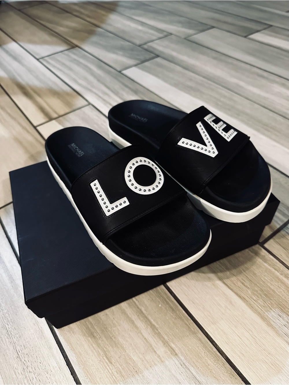 Michael Kors Black and White 'LOVE' Studded Slide Sandals